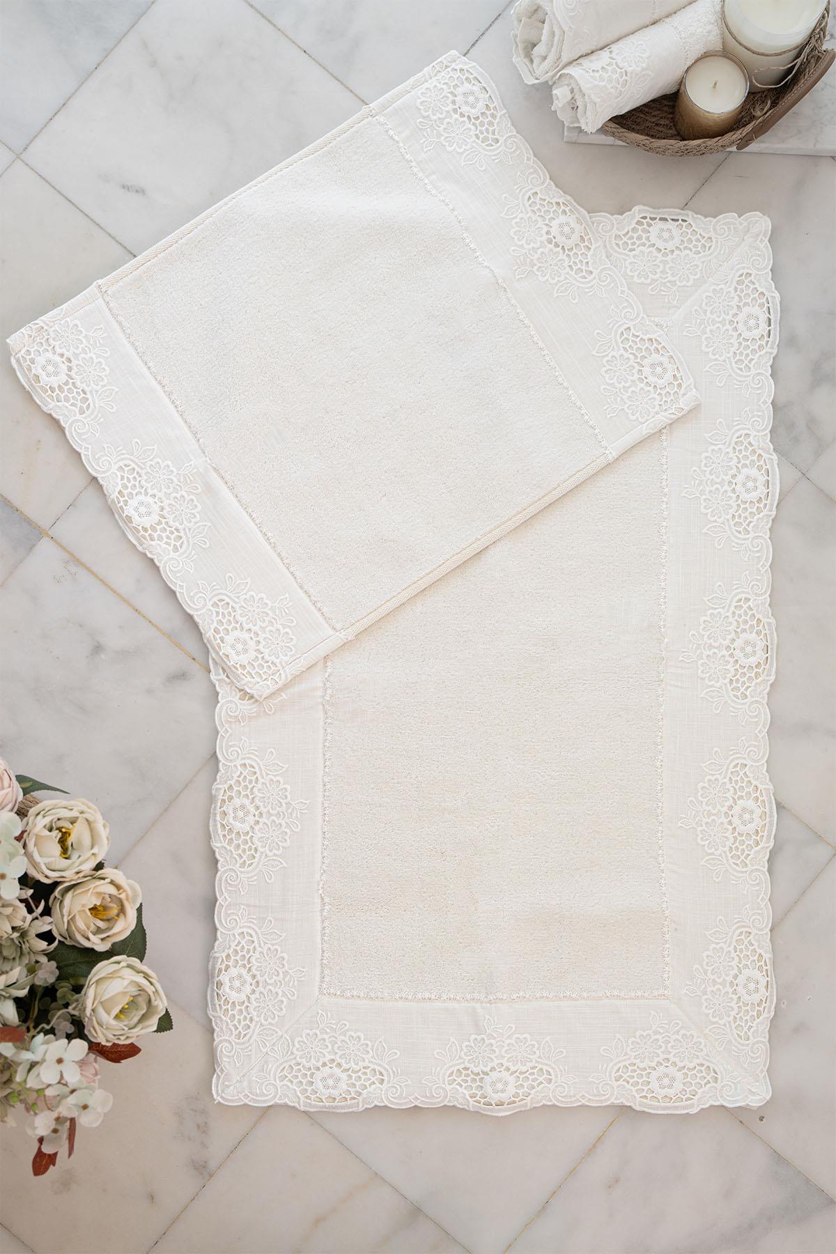 Set di 2 tappetini Puerta con ricamo floreale (60 x 100 cm)