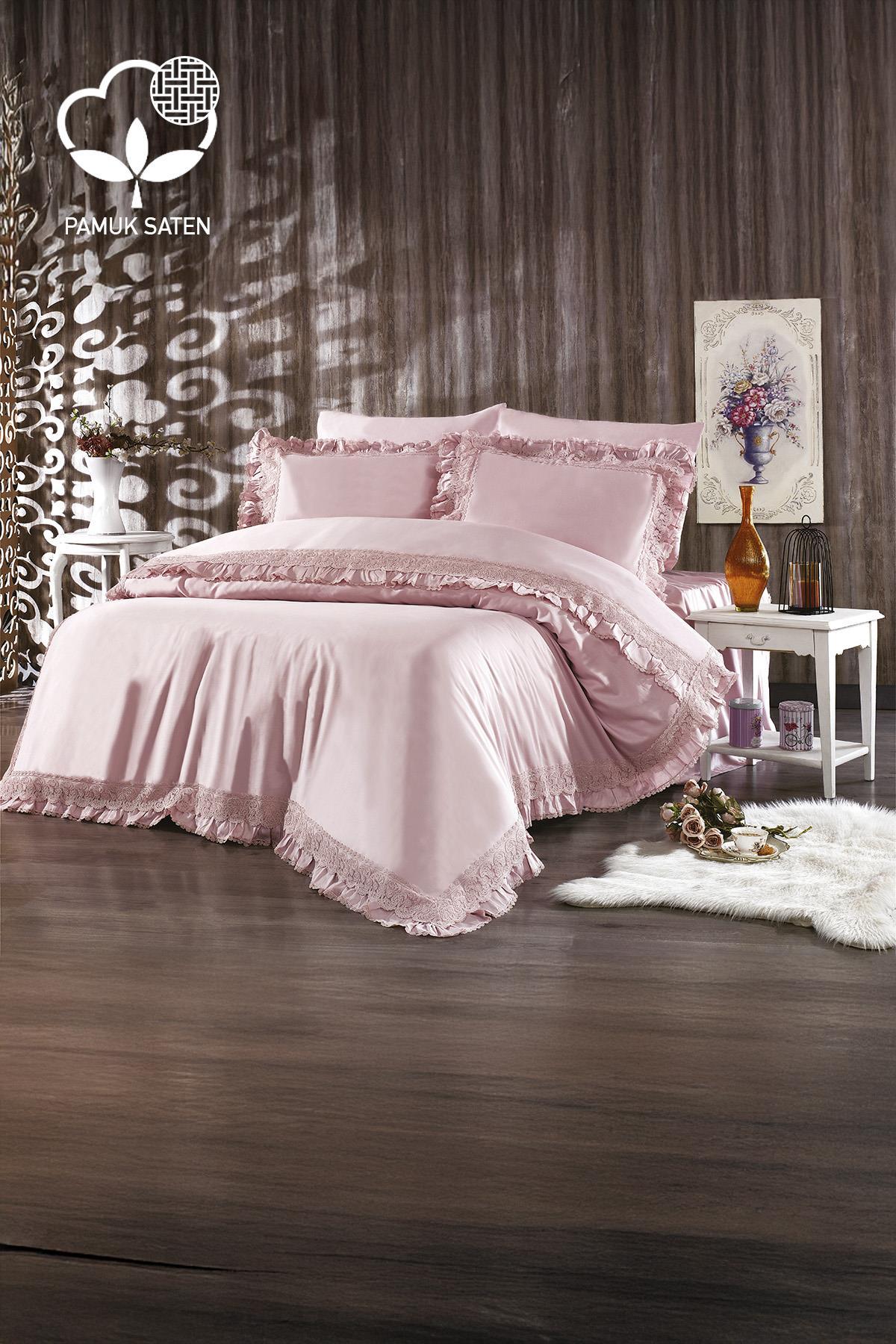 Set copripiumino matrimoniale in raso di cotone biologico con pizzo rosa cipria in camera da letto