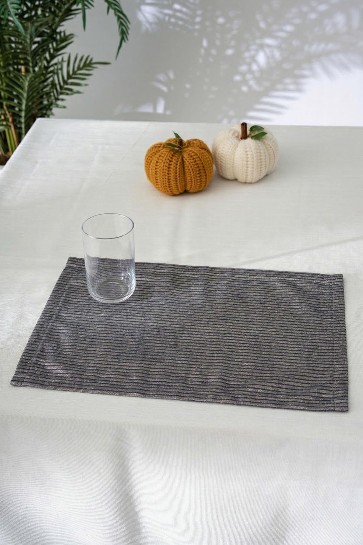 Set di 4 tovagliette americane Loris Leke Tutmaz Dertsiz (35 x 50 cm)